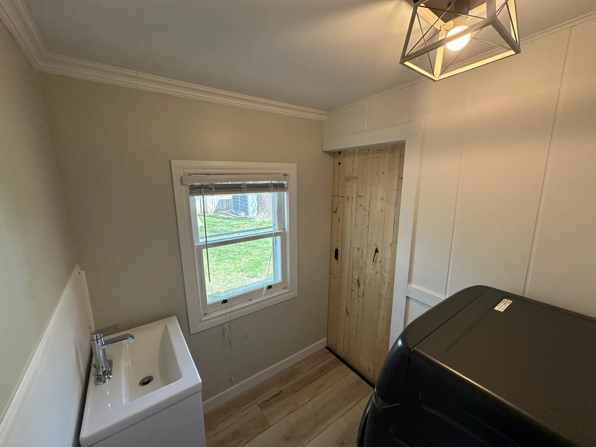 Wood door in a laundry room