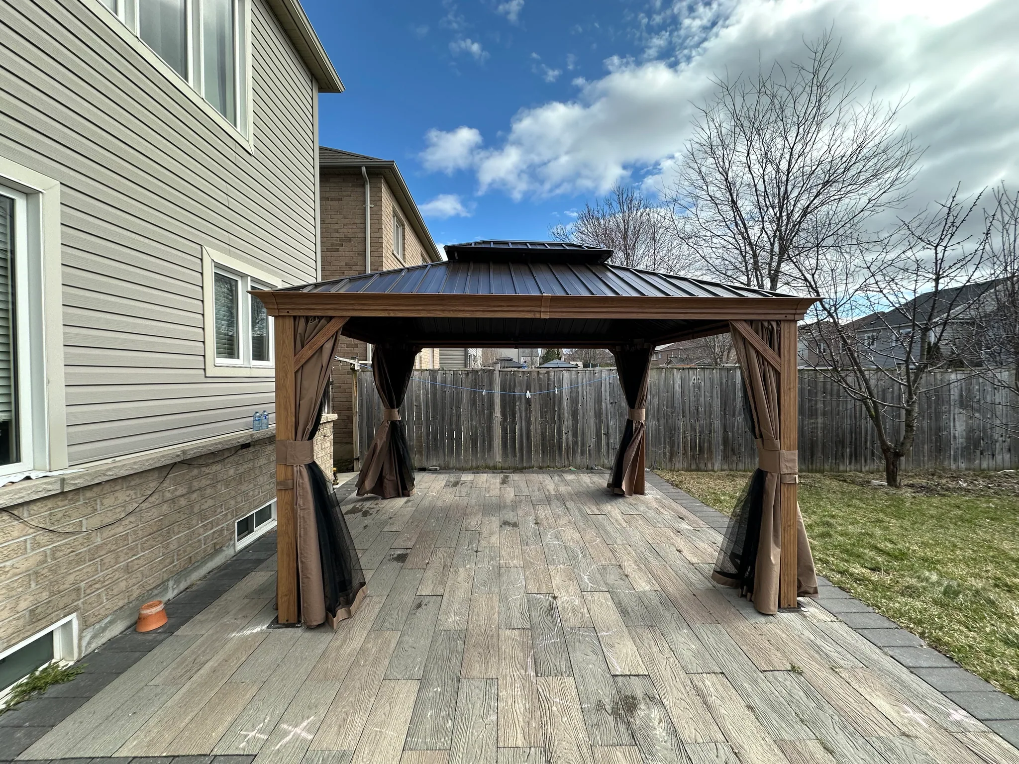Wood gazebo on a backyard patio