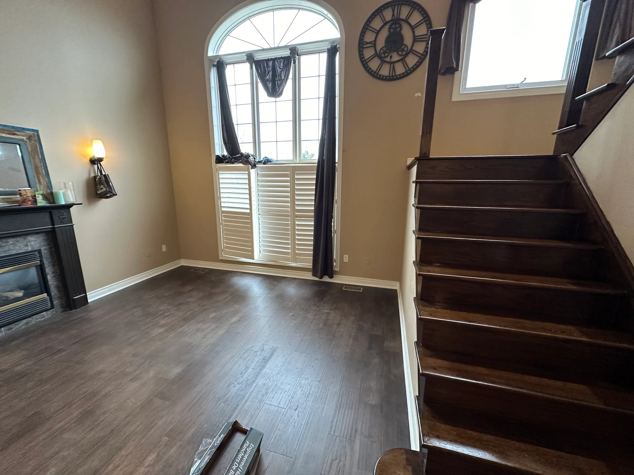 Wood flooring beside a staircase